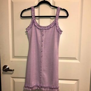 This is a purple and white plaid dress